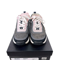 Front view of Chanel pink and grey tweed sneakers size 37.5 with original Chanel box label