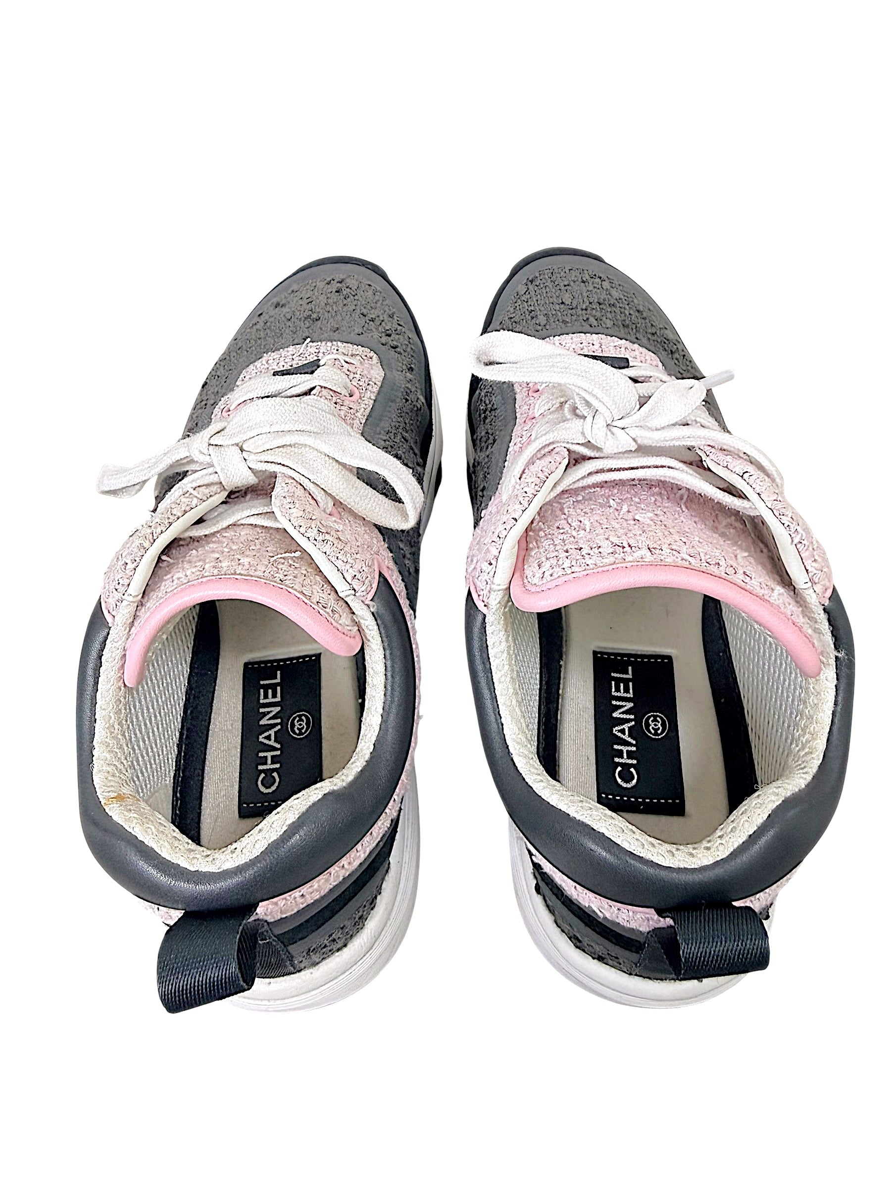Interior view of Chanel tweed sneakers showing insoles, lining and light interior soiling
