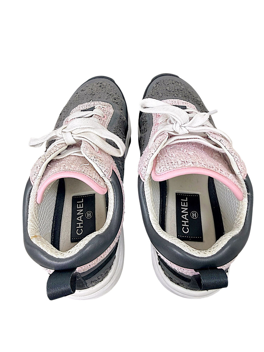 Interior view of Chanel tweed sneakers showing insoles, lining and light interior soiling