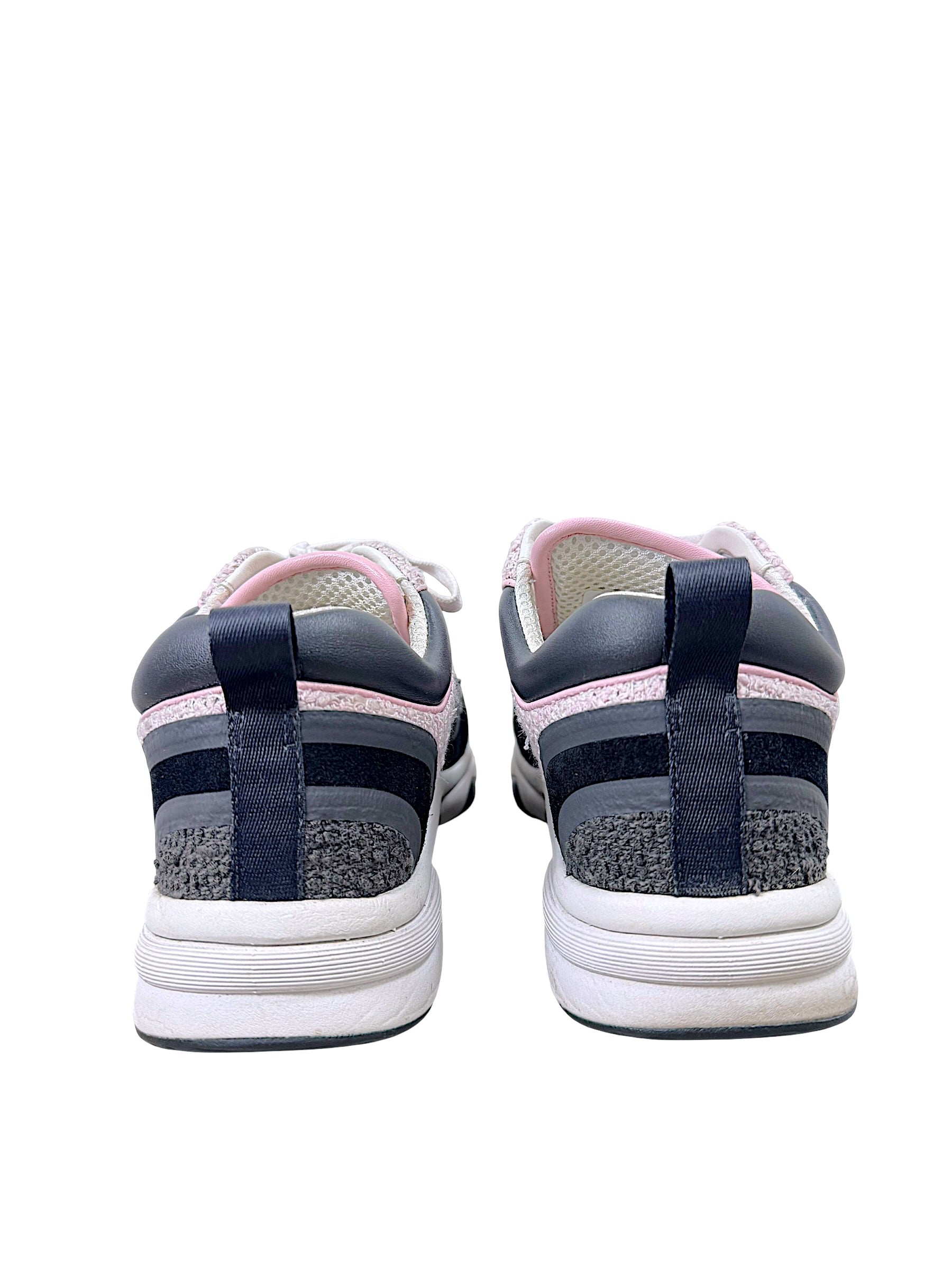 Rear view of Chanel G34360 tweed sneakers showing black heel pull tabs and layered construction