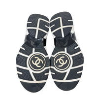 Chanel G34360 sneaker outsoles showing interlocking CC logos and wear consistent with age and use