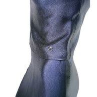 Close-up detail of Chanel CC logo hardware at waist on vintage navy metallic Identification Collection top.