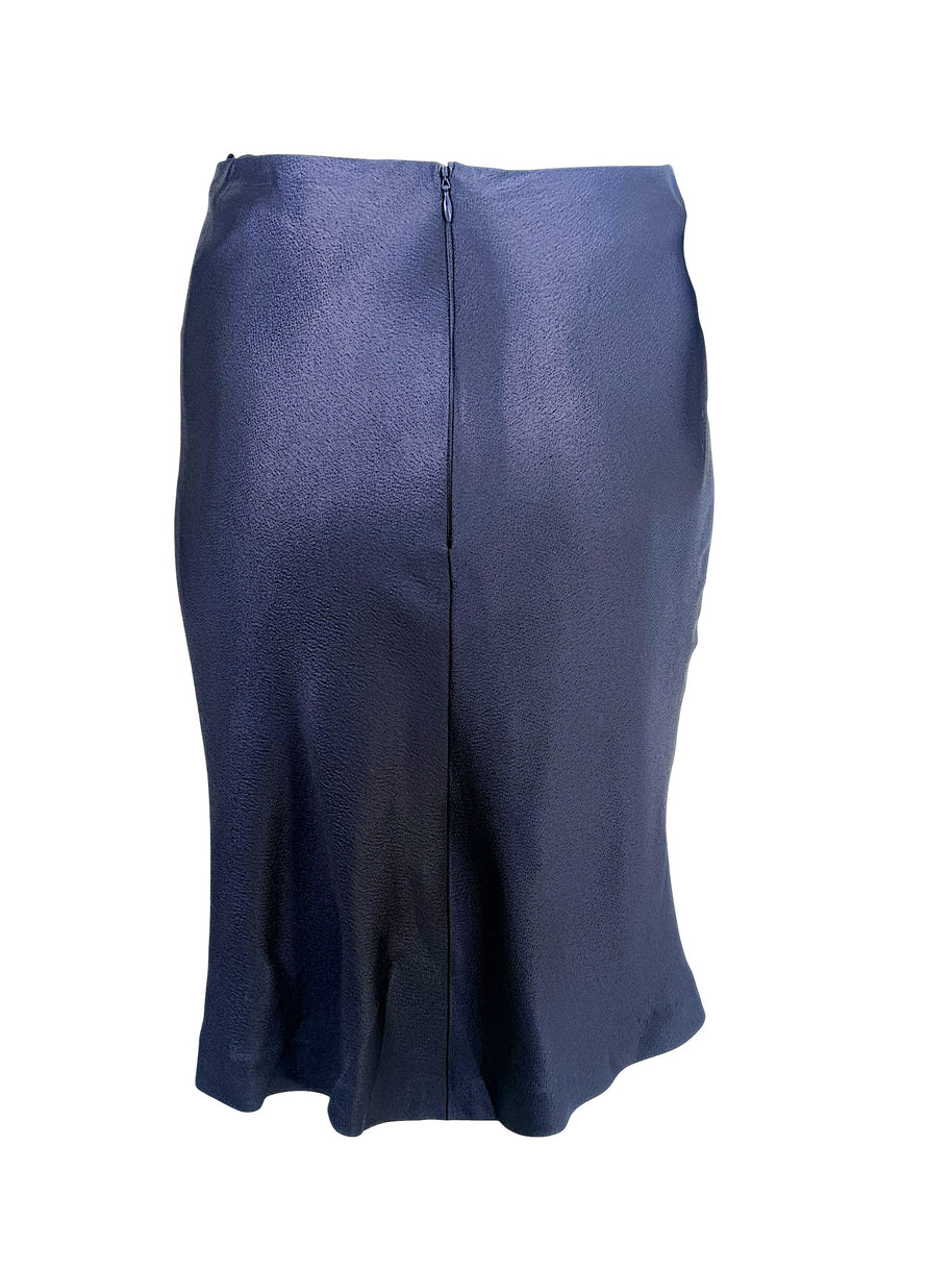 Back view of vintage Chanel Identification Collection navy metallic skirt with concealed rear zipper.