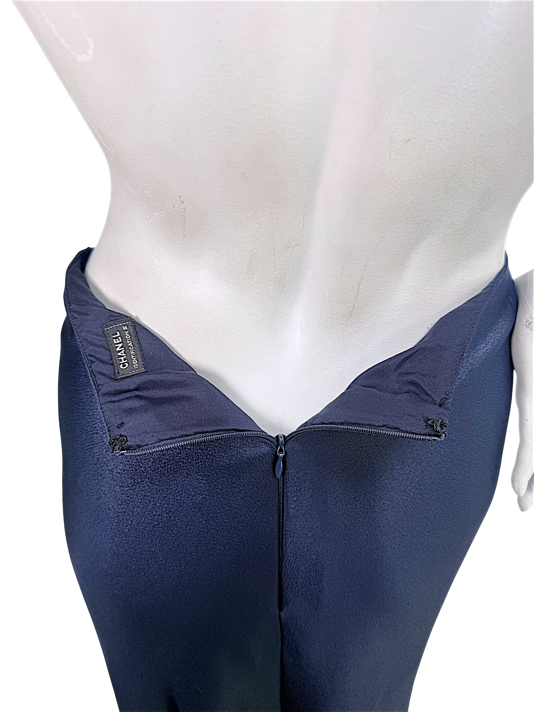 Interior Chanel Identification Collection label and zipper detail inside navy metallic coordinating skirt.