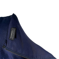 Interior Chanel Identification Collection label detail inside navy metallic top.