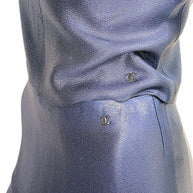 Close-up of vintage Chanel Identification Collection matching CC logo hardware details on top and coordinating skirt.