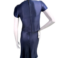 Back view of vintage Chanel Identification Collection navy metallic coordinated top and skirt set with concealed zipper closure.