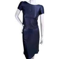 Vintage Chanel Identification Collection navy metallic two-piece skirt set front view featuring short sleeve bateau neckline top and coordinating skirt with subtle CC logo hardware.