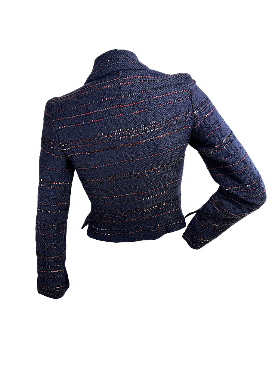 Chanel navy tweed jacket back view with structured seams and burgundy sequin accents