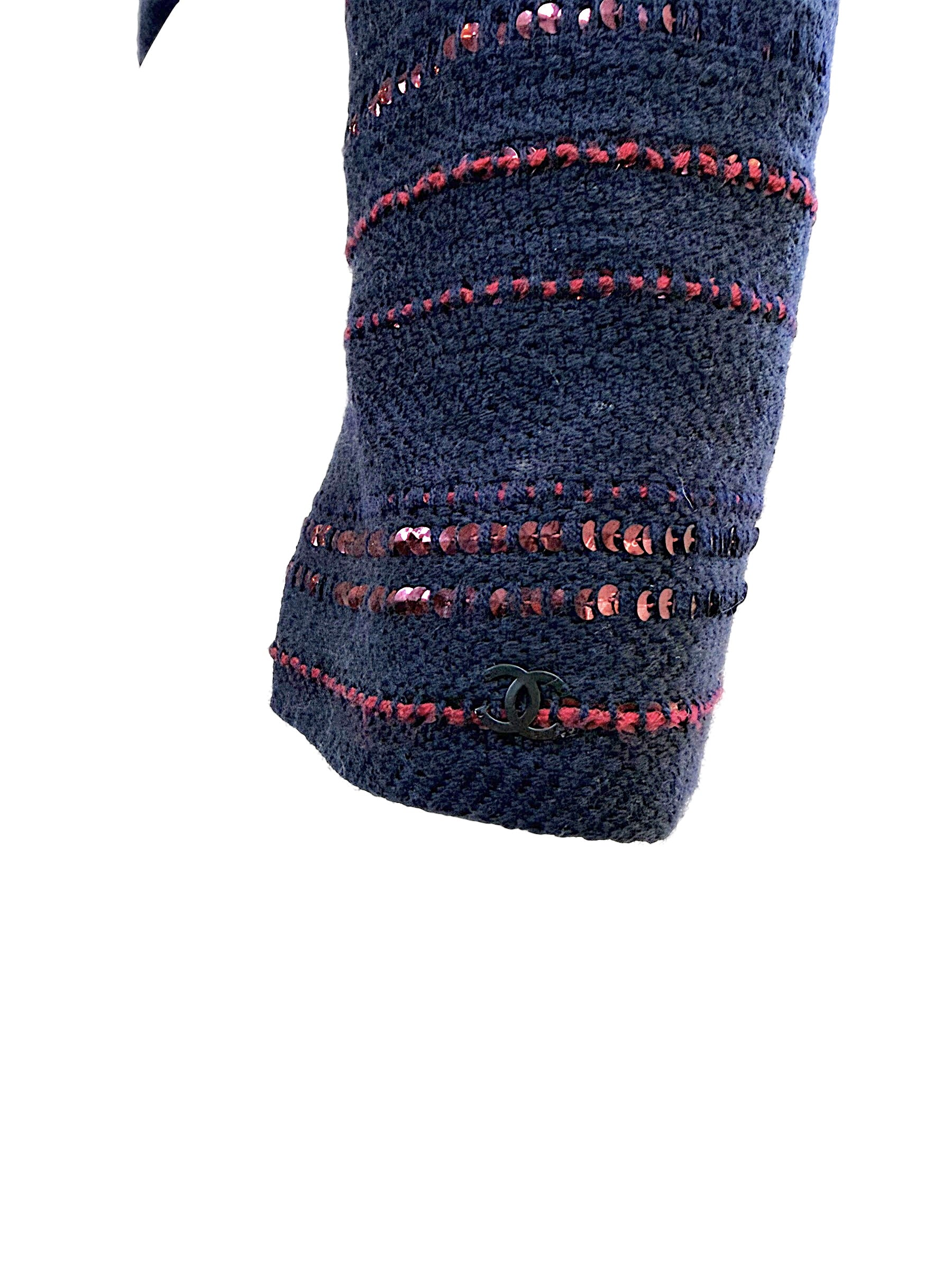 Chanel CC logo detail on sleeve cuff navy tweed with sequin embellishment close up