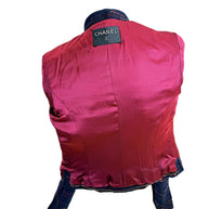 Chanel navy tweed jacket back view with structured seams and burgundy sequin accents