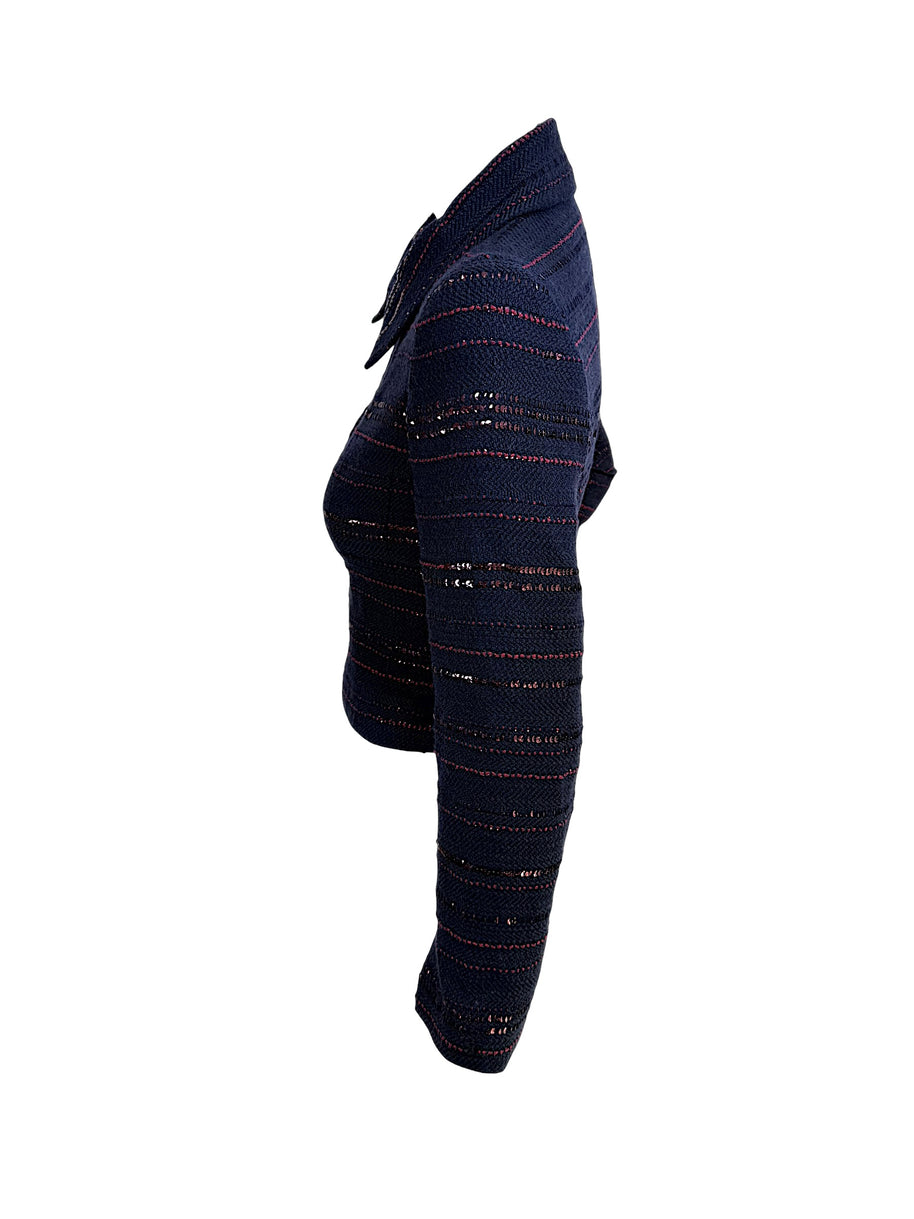 Chanel navy tweed jacket side profile showing fitted waist and sequin stripe detailing