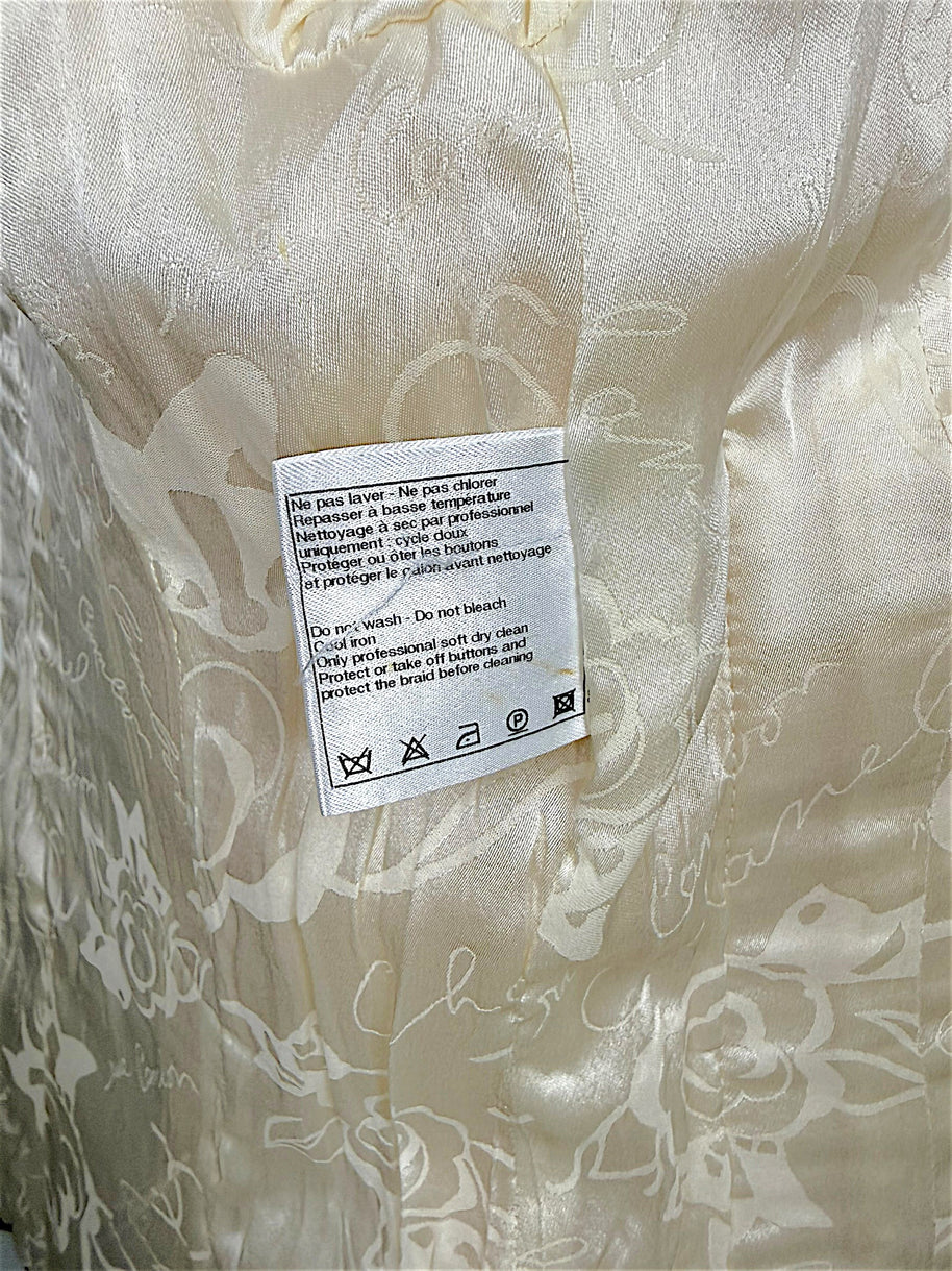 Close-up of original Chanel care instructions label inside the Pre-Fall 2010 Paris-Shanghai jacket.