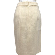 Rear view of Chanel Pre-Fall 2010 ivory bouclé pencil skirt featuring a streamlined tailored silhouette.