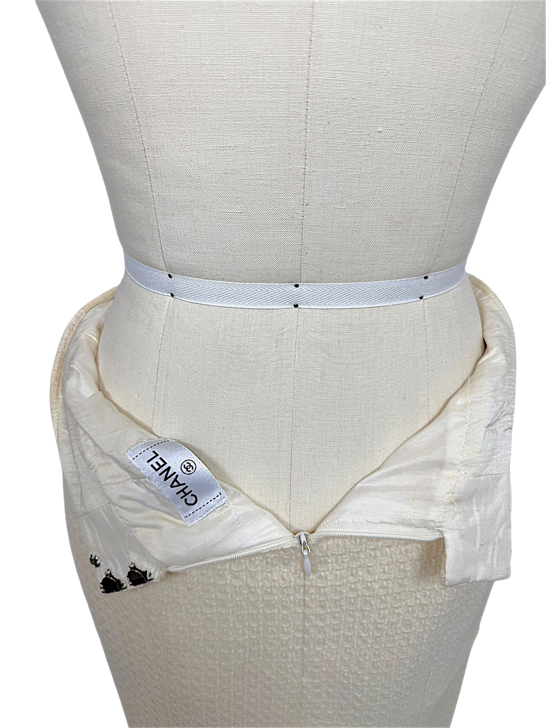 Interior view of Chanel Pre-Fall 2010 pencil skirt showing silk lining, waistband construction and concealed rear zipper.