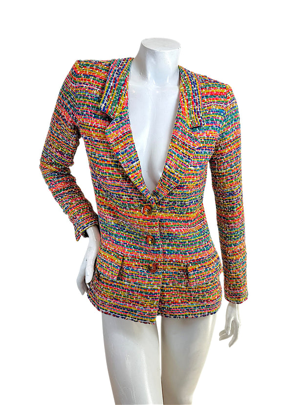 Chanel Resort 2016 multicolor fantasy tweed runway jacket front view with tailored silhouette and CC buttons