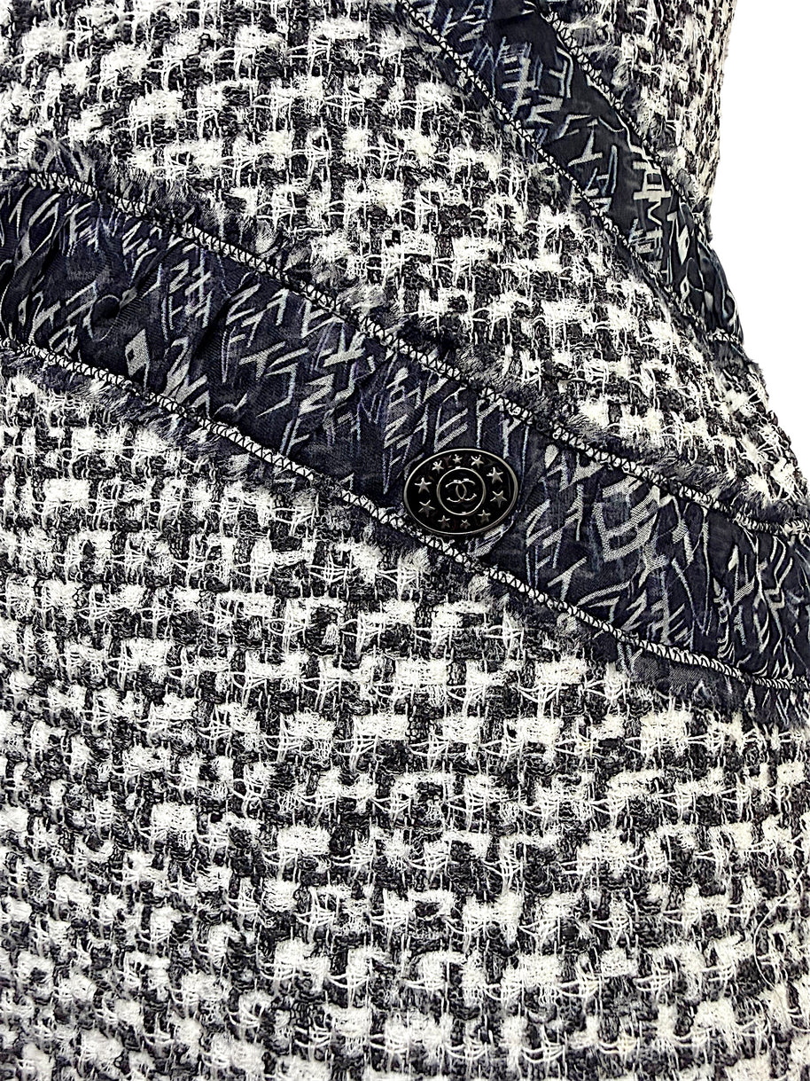 Close-up detail of Chanel silk ribbon trim and CC hardware accent