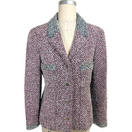 Chanel Boutique Spring 1996 pink black and white tweed jacket front view with CC medallion buttons and contrast collar trim