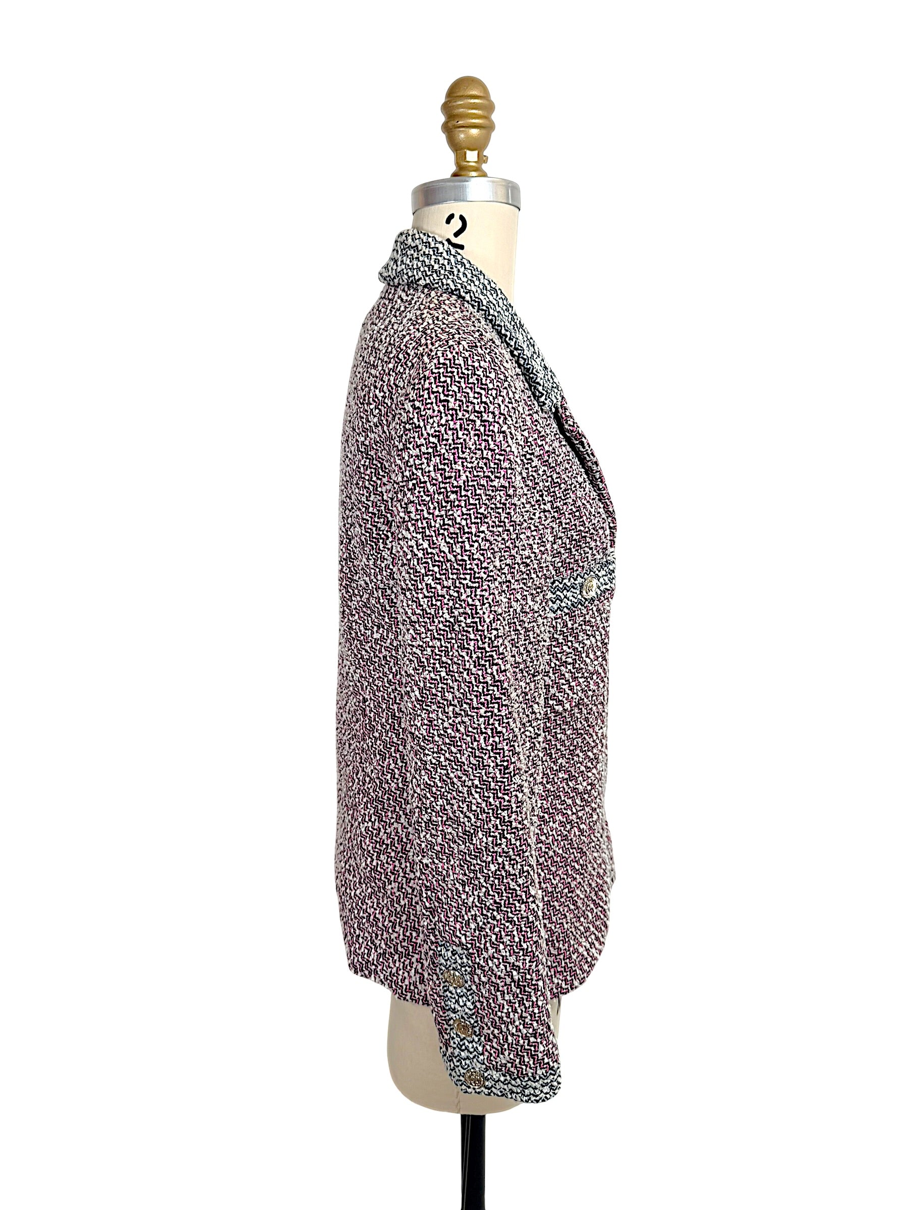 Side profile of vintage Chanel Spring 1996 tweed blazer with structured tailoring and cuff button detailing