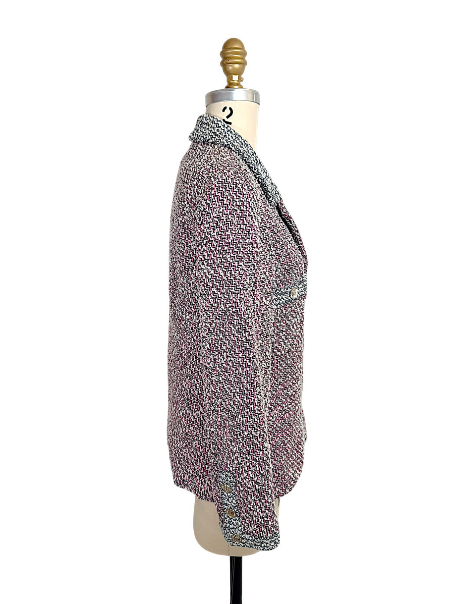 Side profile of vintage Chanel Spring 1996 tweed blazer with structured tailoring and cuff button detailing