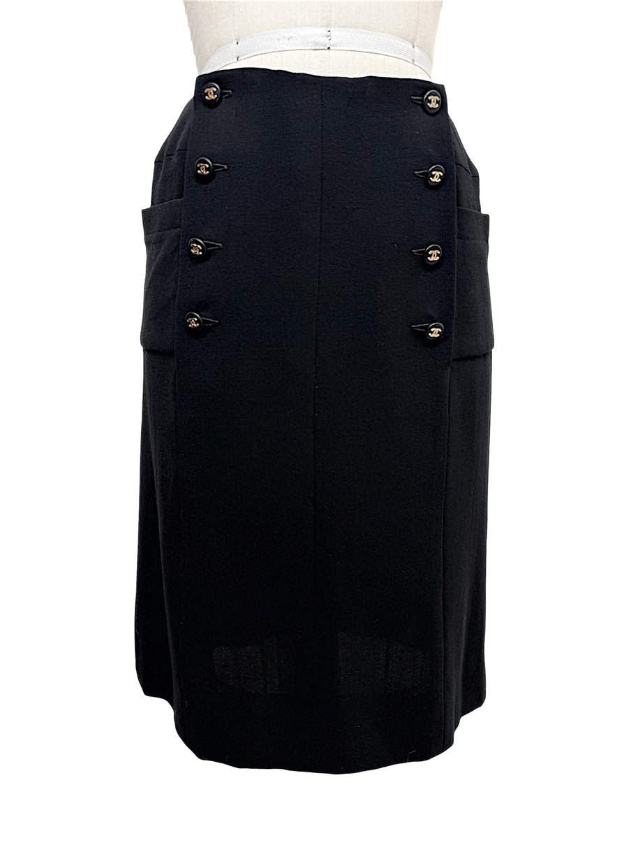 Vintage Chanel Spring 1997 black midi skirt with double-breasted gold CC buttons and oversized patch pockets, front view