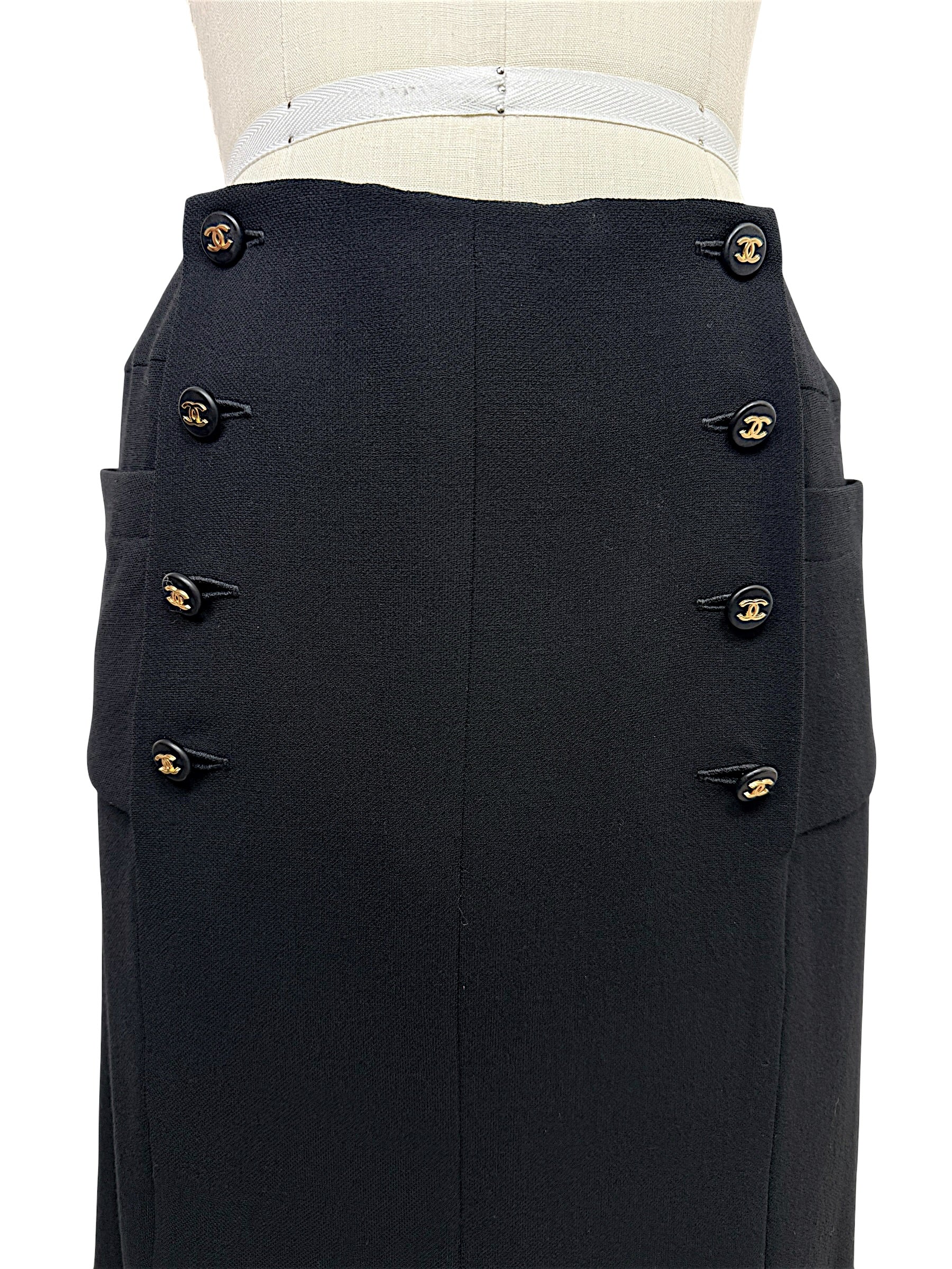 Chanel Spring 1997 black skirt featuring double rows of black and gold interlocking CC logo buttons