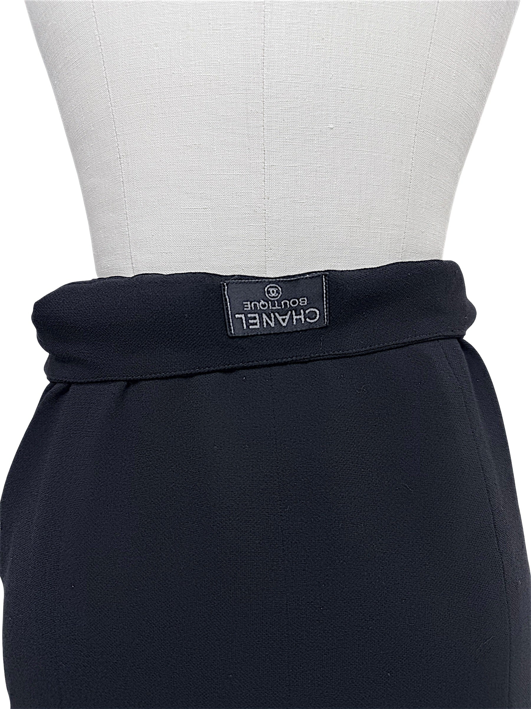 Interior CHANEL BOUTIQUE label on vintage Chanel Spring 1997 black midi skirt