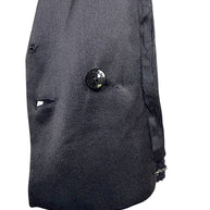 Interior construction detail showing authentic Chanel engraved button and luxury finishing inside the Spring Summer 2005 runway cropped tuxedo jacket.