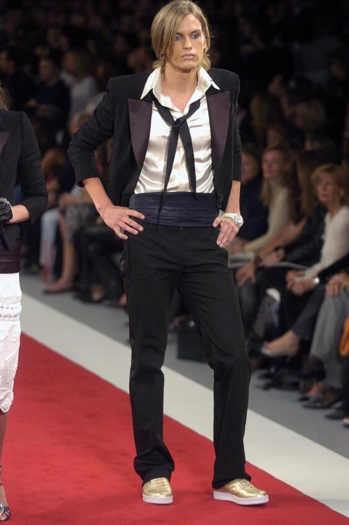 Documented Chanel Spring Summer 2005 runway look featuring the black cropped bouclé tuxedo jacket styled by Karl Lagerfeld.