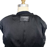 Authentic Chanel neck label inside Spring Summer 2005 runway cropped bouclé tuxedo jacket.