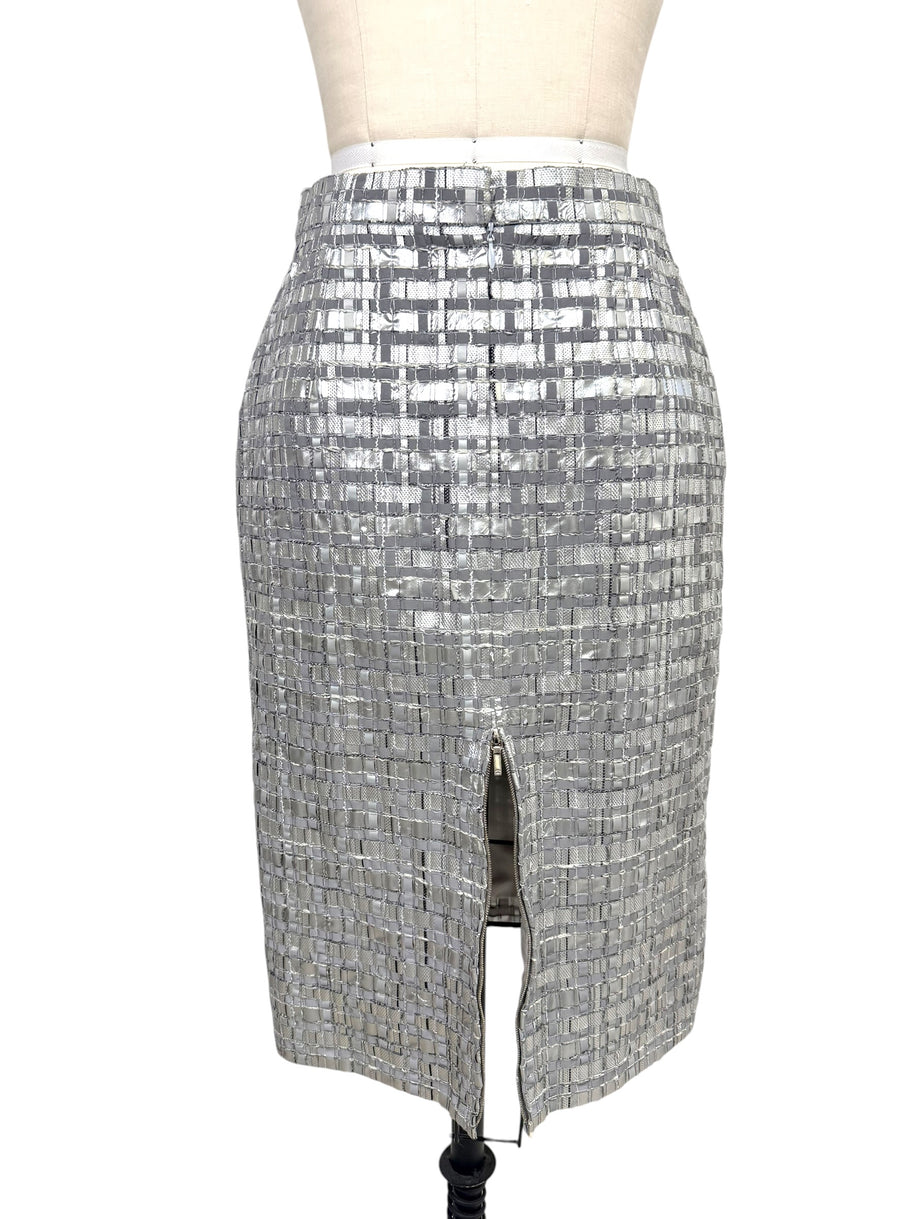 Chanel Spring 2016 silver metallic skirt rear vent shown open.