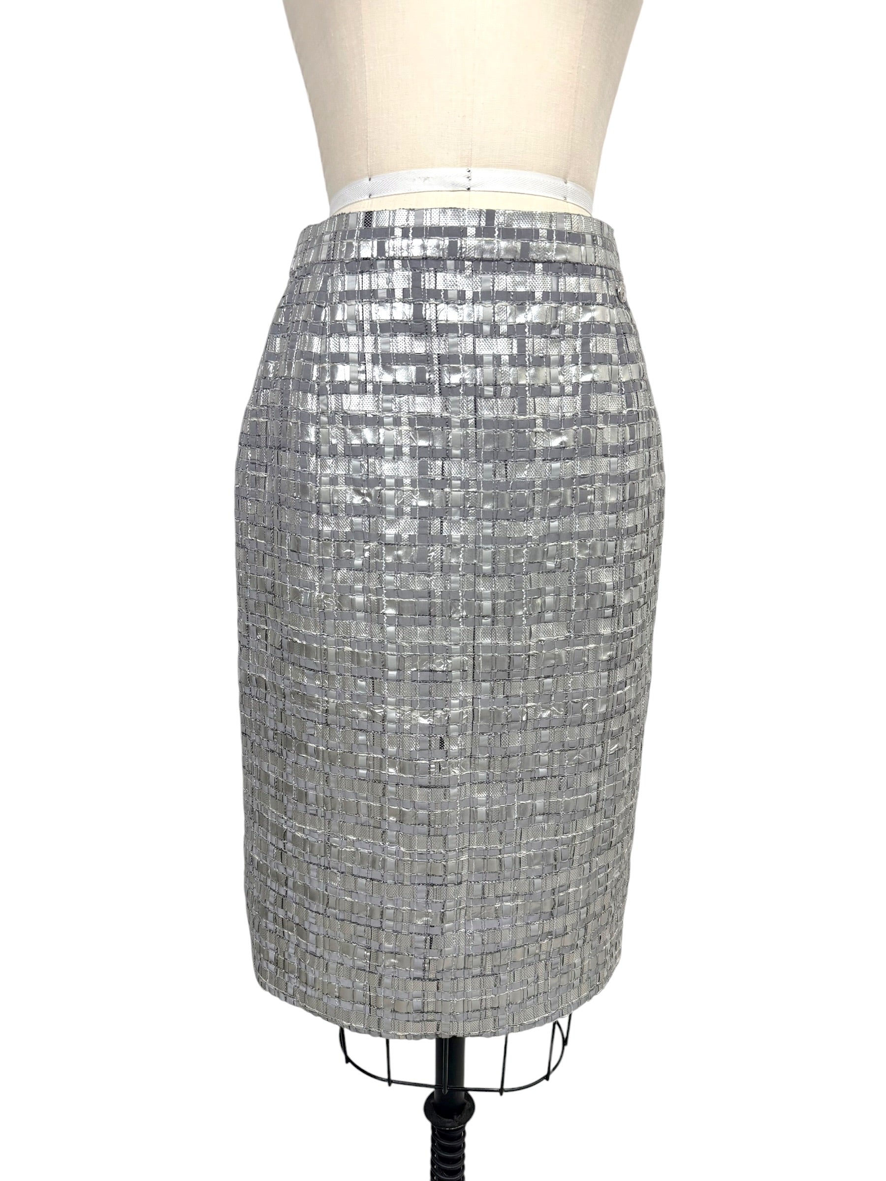 Chanel Spring 2016 silver metallic woven pencil skirt front view on dress form.