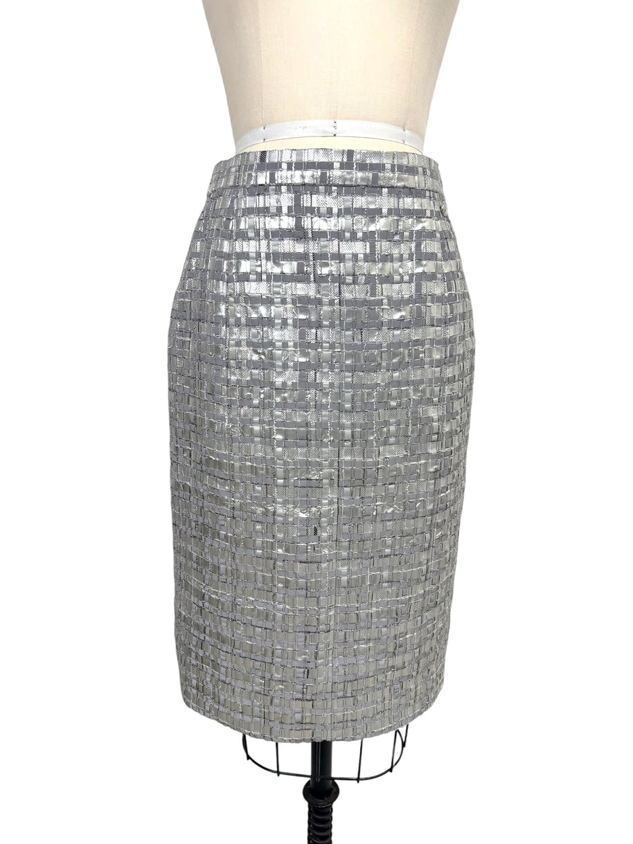 Chanel Spring 2016 silver metallic woven pencil skirt front view on dress form.