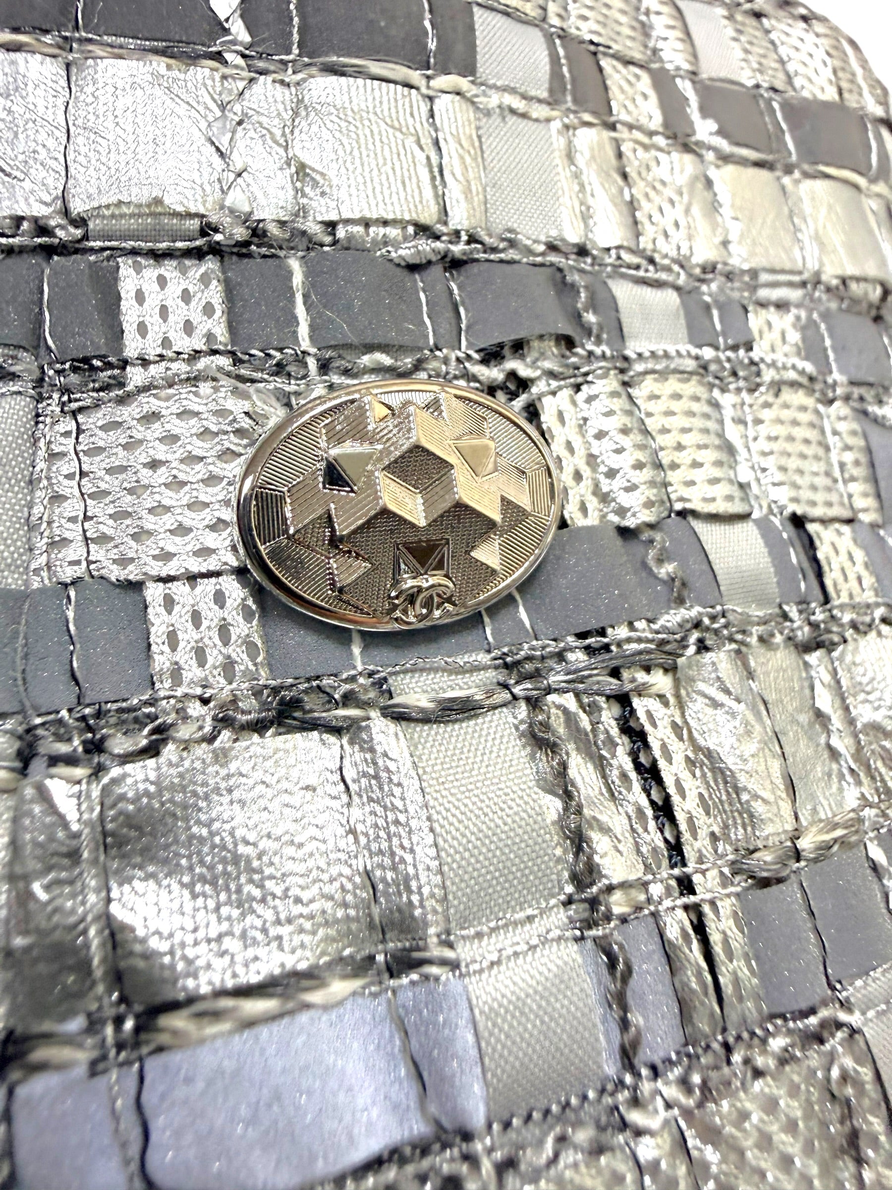 Chanel silver metallic woven skirt geometric CC logo button detail.