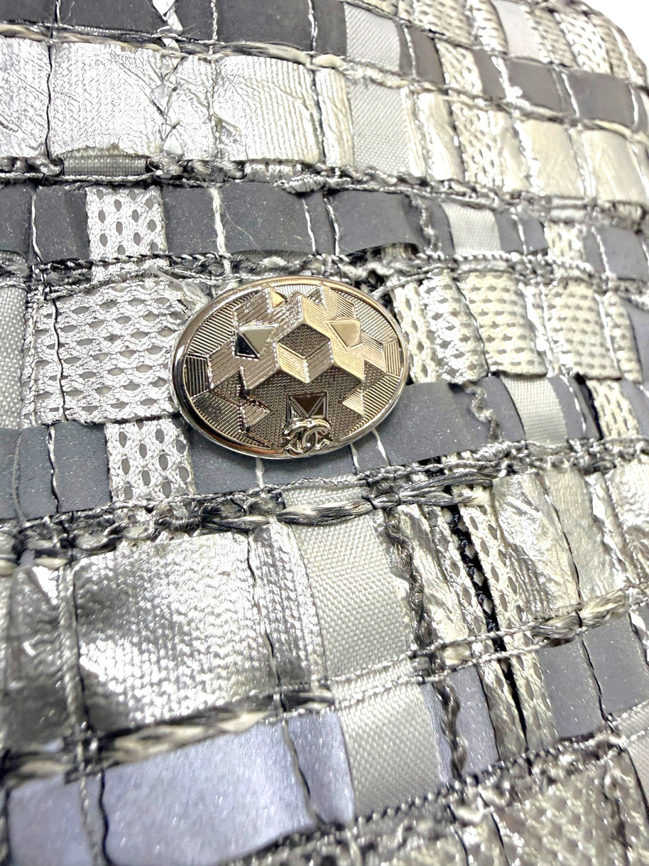 Chanel silver metallic woven skirt geometric CC logo button detail.