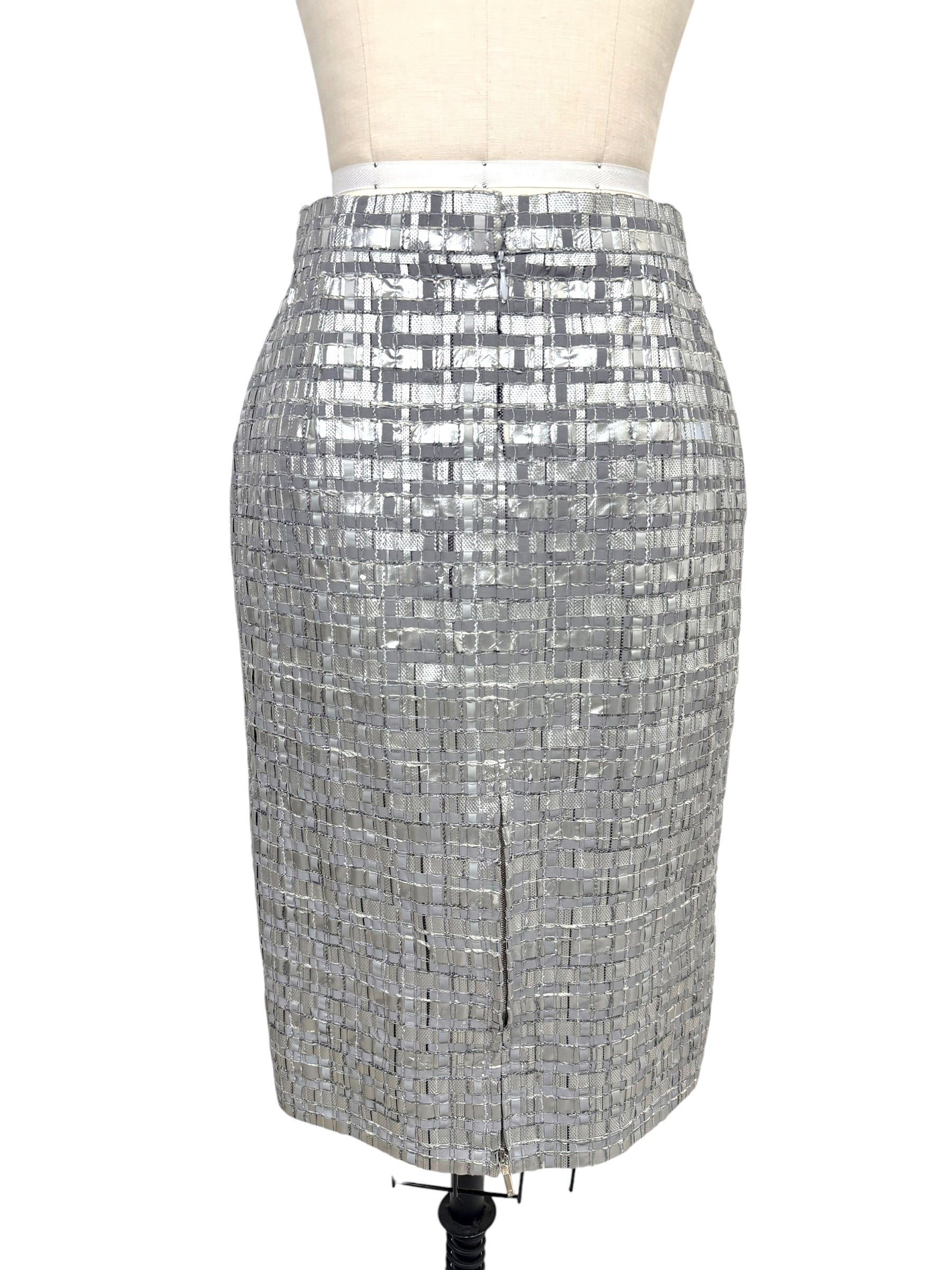 Back view of Chanel Spring 2016 silver metallic pencil skirt with rear vent.