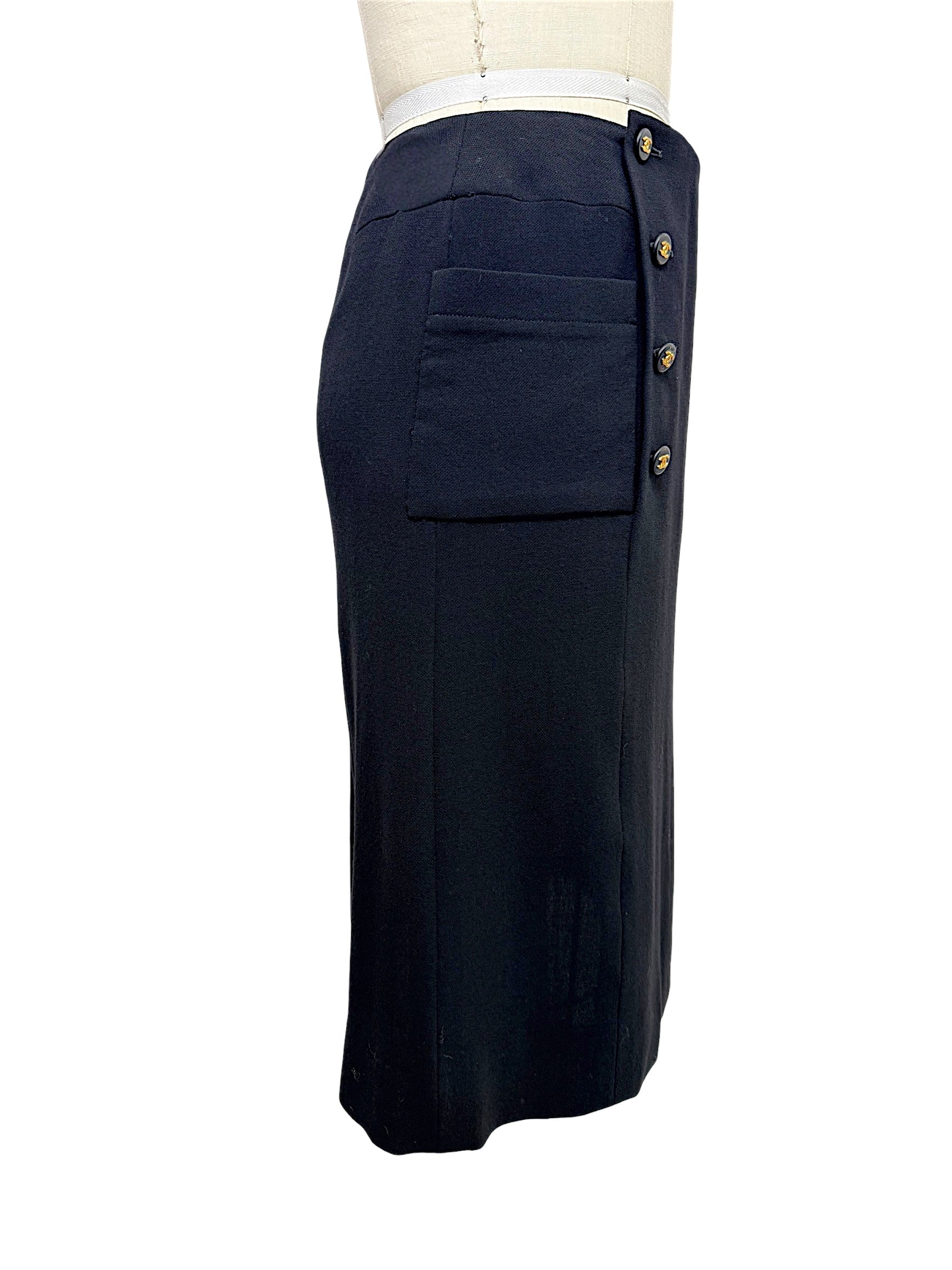 Vintage Chanel Spring 1997 black midi skirt with signature CC buttons and oversized patch pocket, right side view
