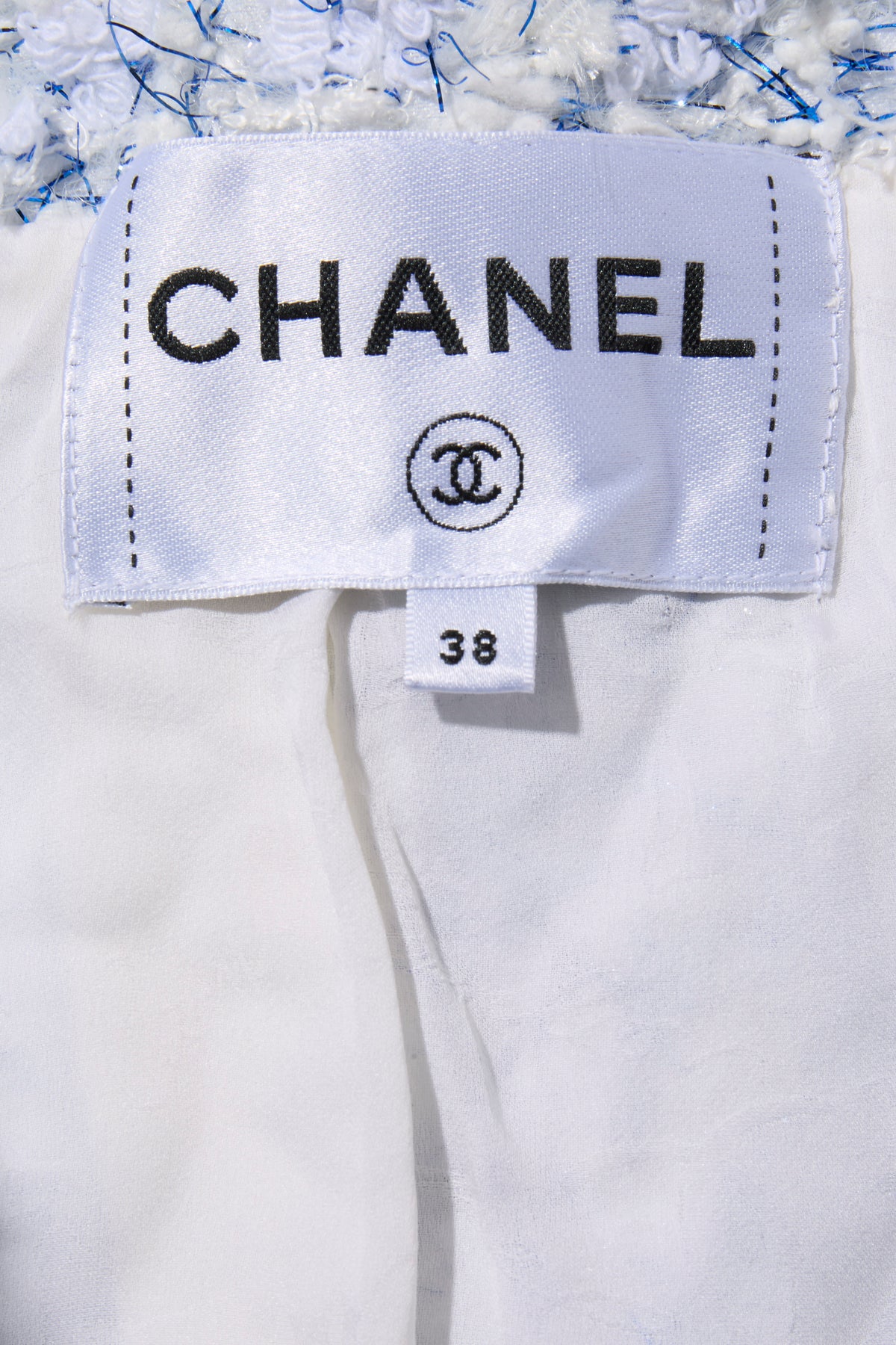 Chanel Spring Summer 2018 light blue tweed jacket interior Chanel brand label