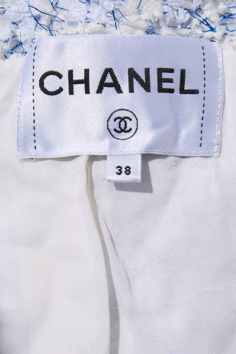 Chanel Spring Summer 2018 light blue tweed jacket interior Chanel brand label