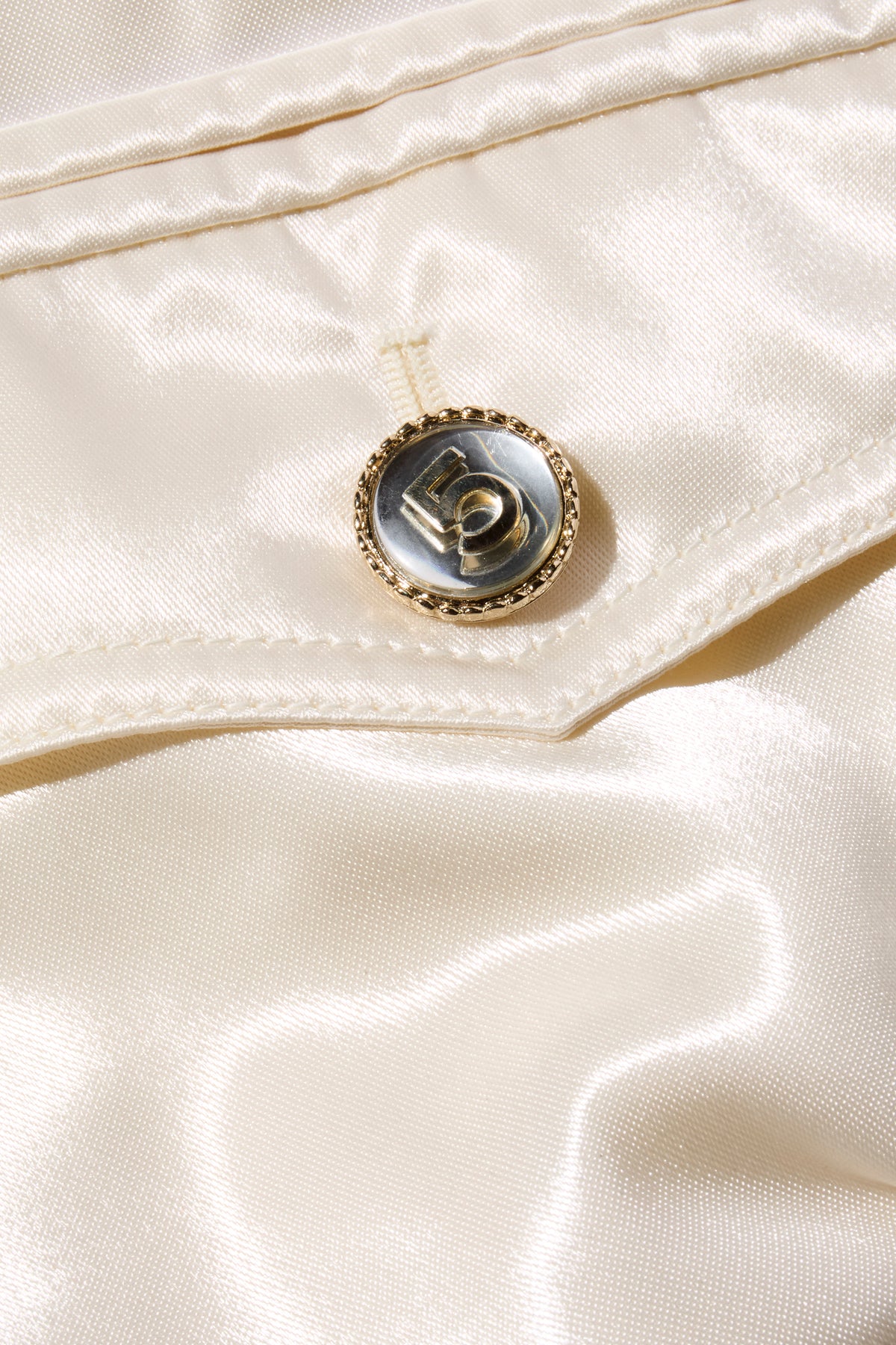 Chanel Spring Summer 2021 satin bomber jacket snap button and pocket detail