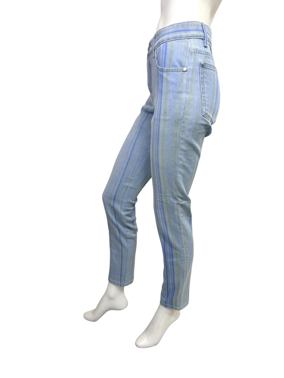 Side profile of Chanel Spring 2006 striped denim jeans in washed light blue stretch denim.