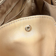 Close-up interior hardware detail showing Chanel construction and condition.