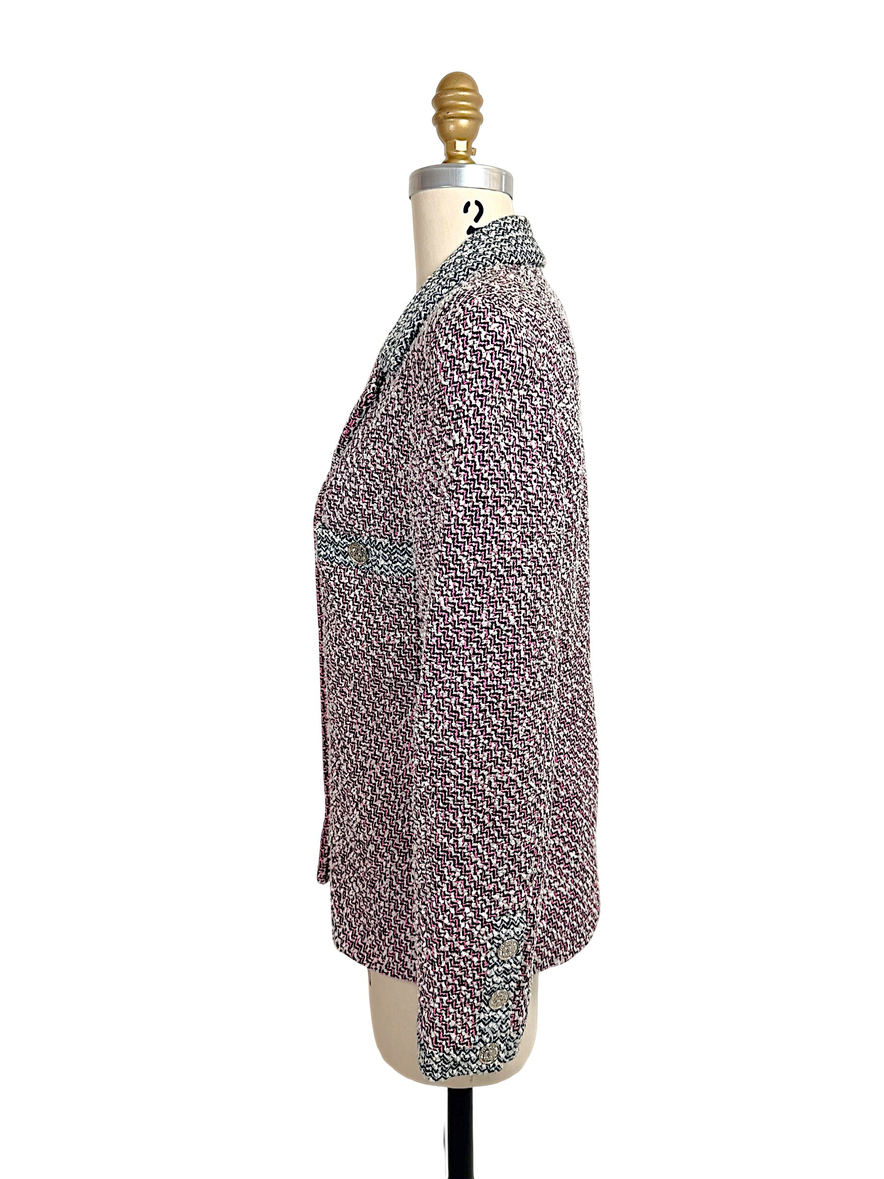 Opposite side profile of Chanel Spring 1996 tweed jacket highlighting tailored fit and textured woven fabrication