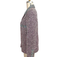 Opposite side profile of Chanel Spring 1996 tweed jacket highlighting tailored fit and textured woven fabrication