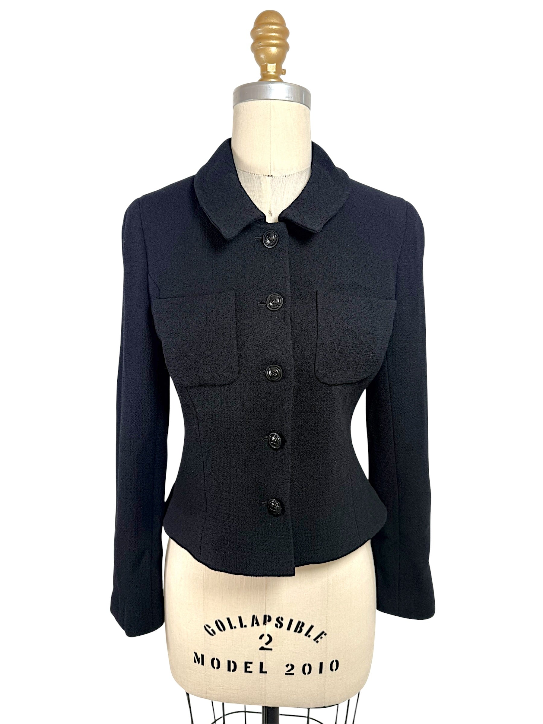 Vintage Chanel Boutique black cropped jacket with CC logo buttons and tailored waist front view