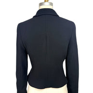 Back view of vintage Chanel Boutique black tailored cropped jacket with fitted silhouette