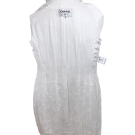 Full interior view of Chanel white bouclé tweed dress with signature silk CC jacquard lining and label detail