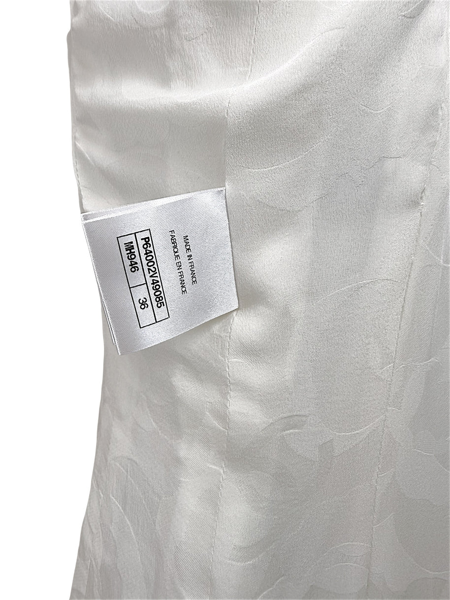 Authentic Chanel production and made in France tag inside white bouclé tweed short sleeve dress