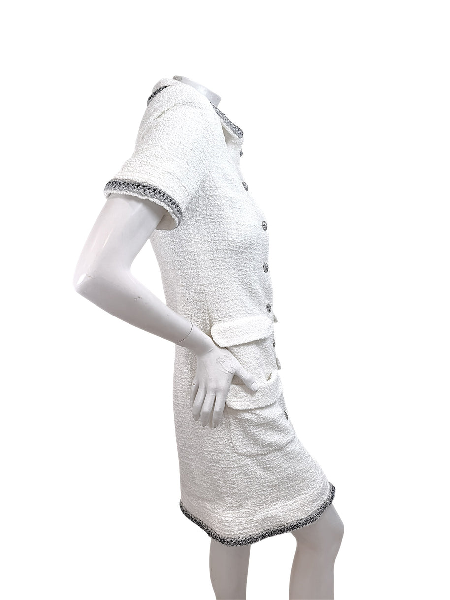 Right side profile of Chanel white bouclé tweed button front dress with short sleeves and fitted silhouette