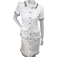 Authentic Chanel white bouclé tweed short sleeve button front dress with metallic trim and flap pockets size FR 36 front view